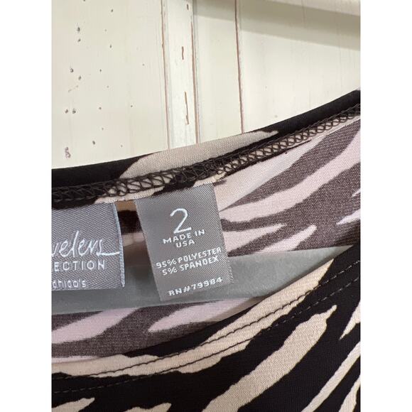 Chicos Travelers size 2 medium animal print top slinky asymmetrical hem - Picture 4 of 4